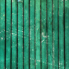 Turquoise wooden timber / scuffed planks background texture.