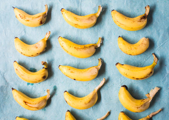 Wall Mural - Lots of Bananas on a Blue Background