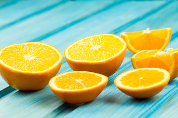 Wall Mural - Ripe orange fruit on wooden vintage background. Healthy vegetarian food. Recipe, menu, mock up, cooking.