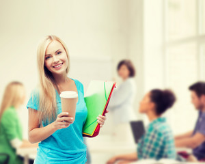 Canvas Print - smiling student with folders