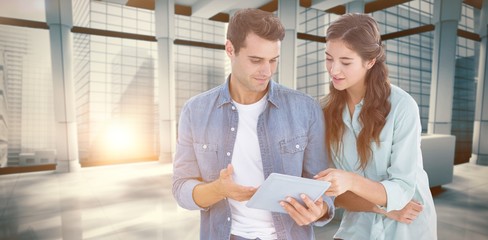 Poster - Composite image of business people with tablet