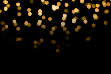 abstract golden yellow colorful circle blur bokeh lights for christmas festival background. defocuse