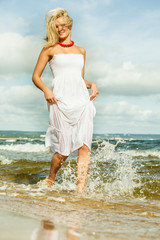 Canvas Print - Beautiful blonde girl on beach, summertime