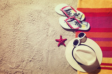 Top View Of Sandy Beach With Summer Accessories And Copy Space