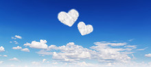 Blue Sky With Hearts Shape Clouds. Beauty Natural Background
