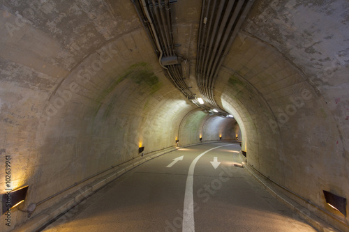 Fotografie, Obraz Interior of an urban tunnel at mountain without traffic..