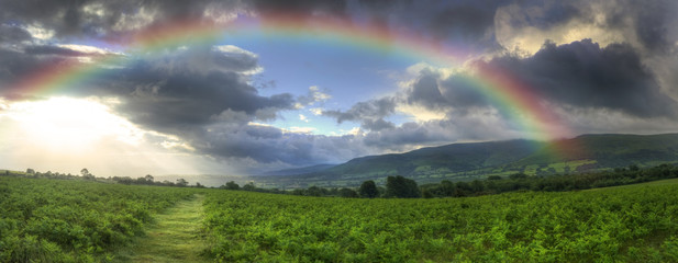 Wall Mural - Stunning Summer sunset across countryside landscape with dramati