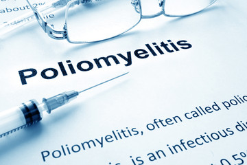 Paper with diagnosis Poliomyelitis. Polio vaccination concept.