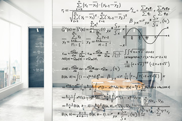 Transparent wall with equations in modern conference room