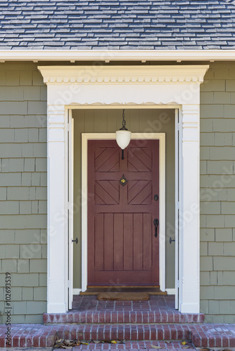 Narrow Front Door With White Trim And Green Facade This Stock Narrow Front Door With White Trim And Green Facade