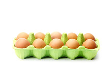Eggs In Green Egg Box Isolated On White Background