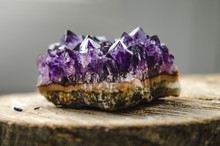 Raw Amethyst Rock With Reflection On Natural Wood Crystal  Ametist