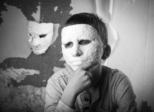 Boy With Carnival Mask
