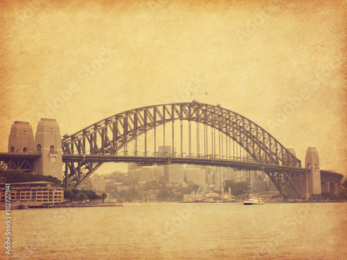 Fototapety Sydney  sydney-harbour-bridge-w-stylu-retro-australia-dodano-teksture-papieru-stonowany-obraz
