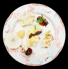 Wall Mural - Cheese plate with fruits and nuts