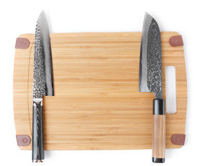 Two different japanese knives on cutting board