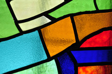 Image Of A Multicolored Stained Glass Window With Irregular Bloc