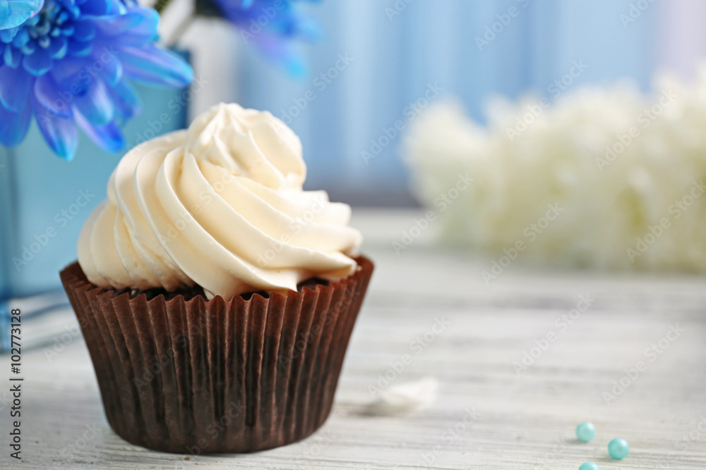 Cupcake on wooden table