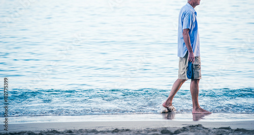 海岸を寂しく歩く中年の男性 Buy This Stock Photo And Explore Similar Images At Adobe Stock Adobe Stock