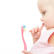 little child baby brushing teeth