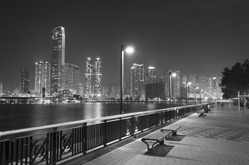 Wall Mural - Seaside Promenade of Harbor in Hong Kong city at night