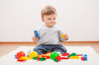 © djoronimo - Little boy playing with blocks