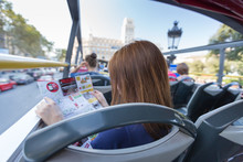 Young Woman With Map In Turistic Bus