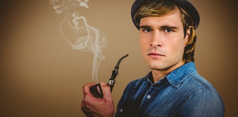Aufkleber - Composite image of serious hipster holding pipe