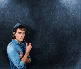 Aufkleber - Composite image of serious hipster smoking pipe