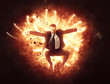 © XtravaganT - Businessman bursting through a wall of fire