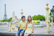 © Ekaterina Pokrovsky - Beautiful young dating couple in Paris