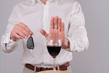 Man Refuses To Drink Wine. Don't Drink And Drive Concept