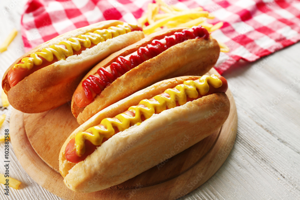 Hot dogs with fried potatoes closeup
