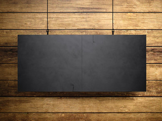 Wall Mural - Photo of blank black vintage canvas hanging on the wood background. 3d render