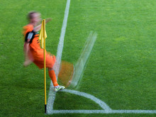 Soccer Player Kicks A Ball From A Corner Kick - Intentional Blur.