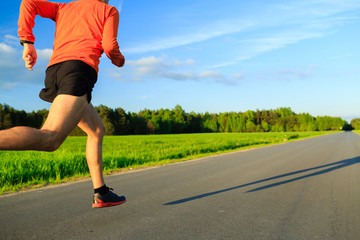 Man running on country road, training inspiration and motivation