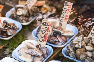 Raw seafood selling on market in Japan