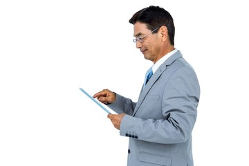 Poster - Businessman using his tablet 