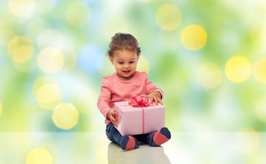 Wall Mural - happy little baby girl with birthday present