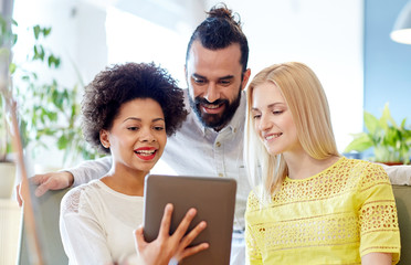 Canvas Print - happy creative team with tablet pc in office