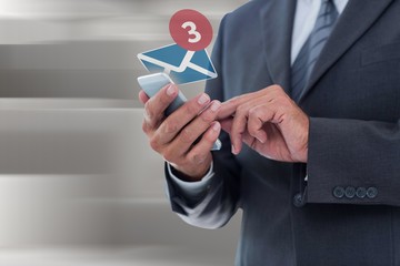 Poster - Composite image of businesswoman using smart phone