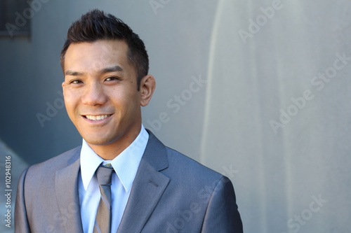 Foto Portrait of a natural handsome classic Asian male with copy space on the right