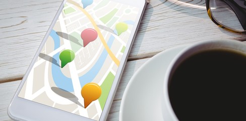Poster - Composite image of multi colored navigation pointers on map