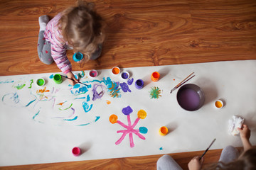 Two girls painting