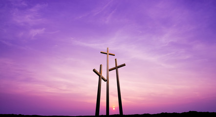 Poster - Three crosses on a hill over bright sky