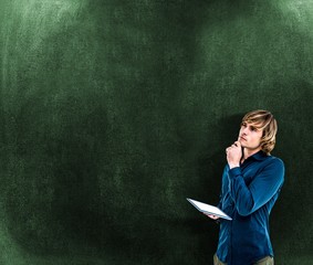 Poster - Composite image of thoughtful hipster businessman using tablet