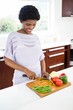 © WavebreakmediaMicro - Pregnant woman preparing vegetables