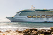 © dbvirago - Cruise Ship Moored in Sun by Seawall
