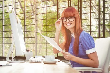 Poster - Composite image of smiling hipster woman with document 