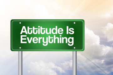 Attitude is everything green road sign, business concept background